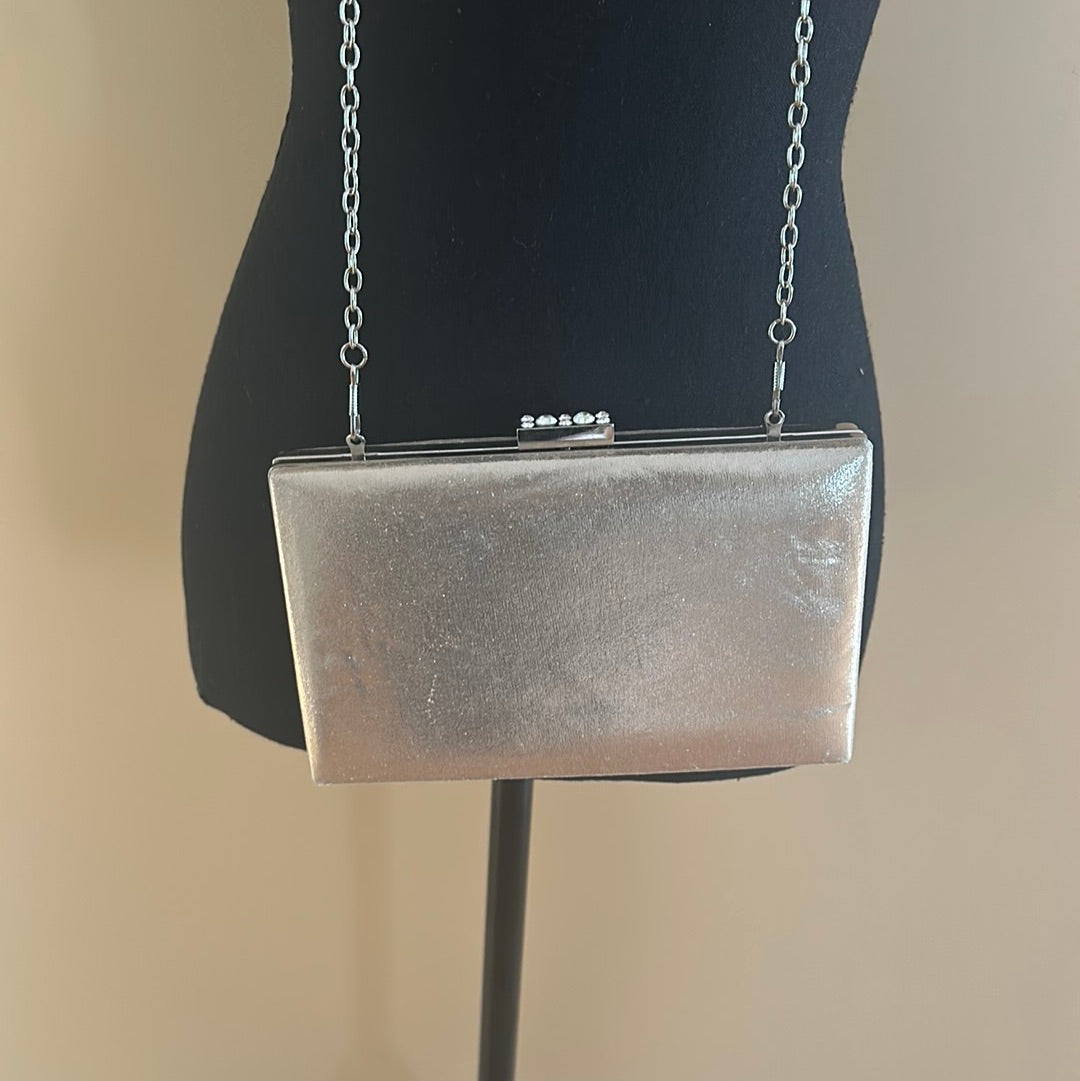 Gold shimmery evening bag with silver hardware