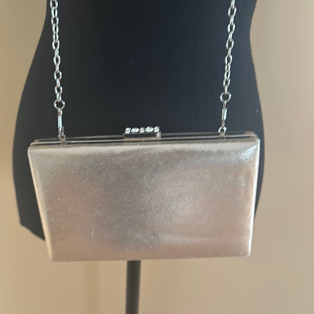 Gold shimmery evening bag with silver hardware